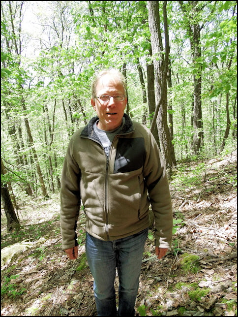 Jim hikes the hills.