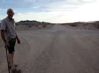 Dusty. And long. Quiet surrounds you. Just the wind.